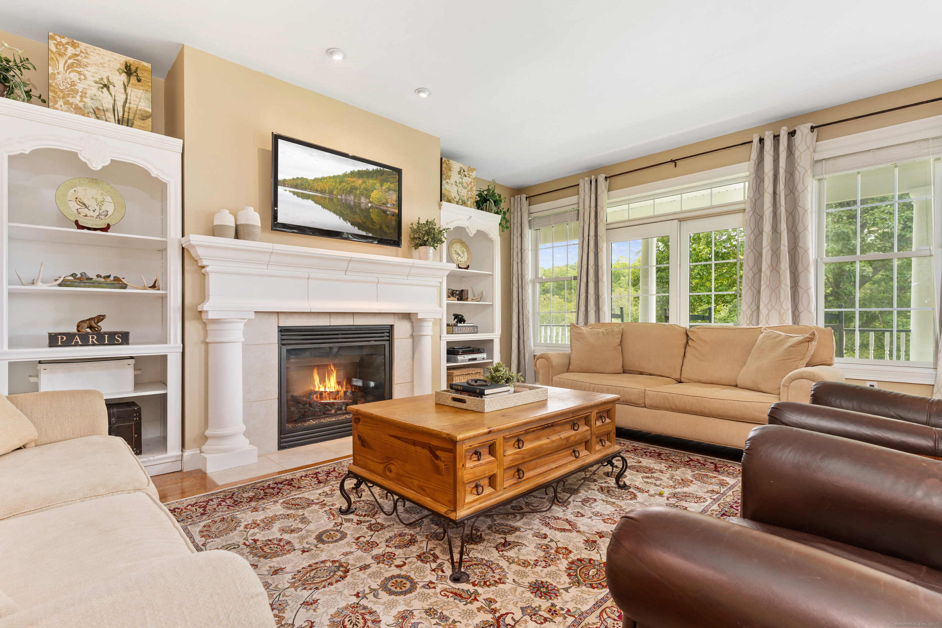 66-86 Bebbington Road Ashford, CT 06278 - Photo 6 of 39 a living room with furniture and a fireplace