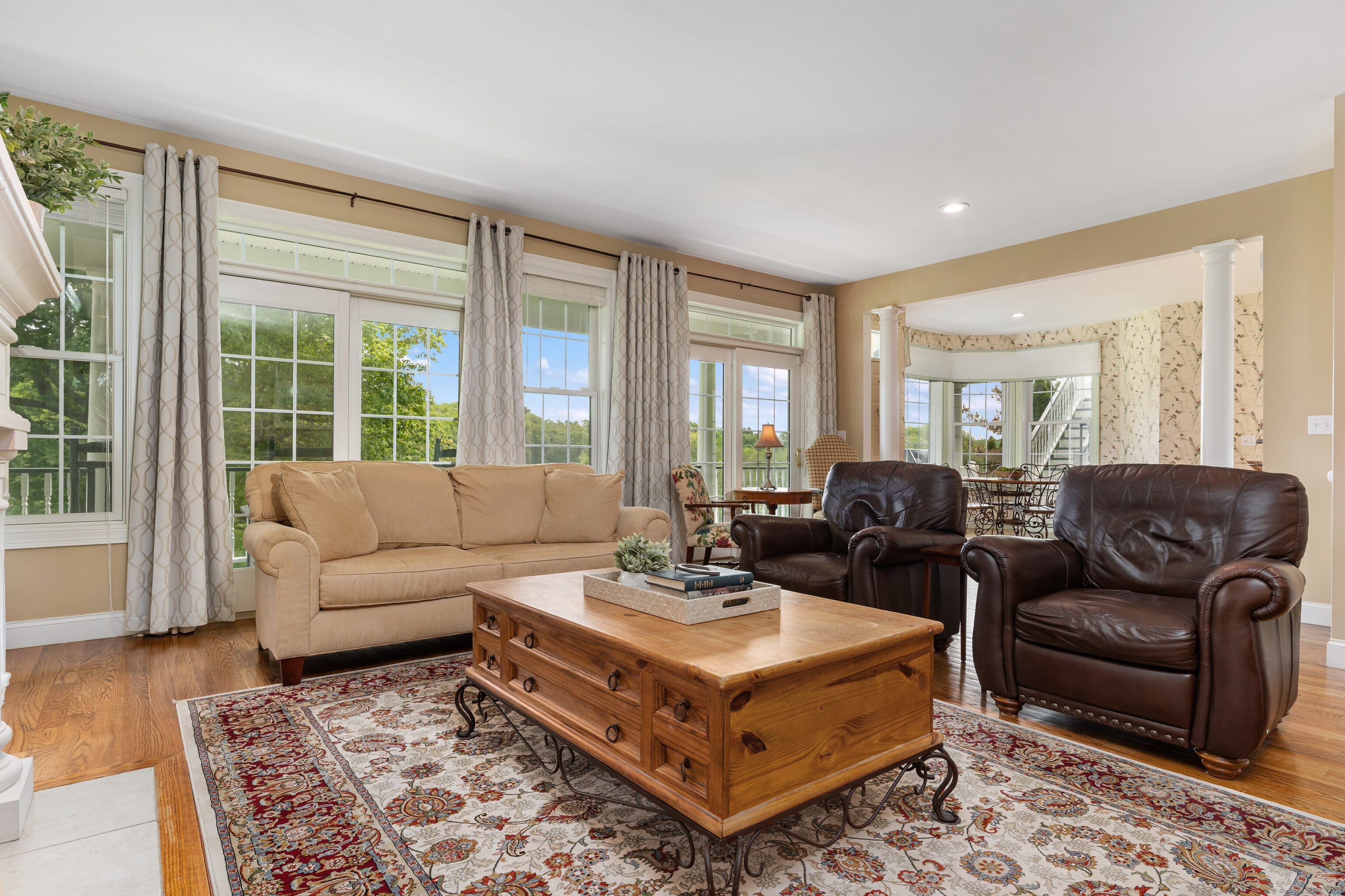 66-86 Bebbington Road Ashford, CT 06278 - Photo 8 of 39 a living room with furniture and a large window