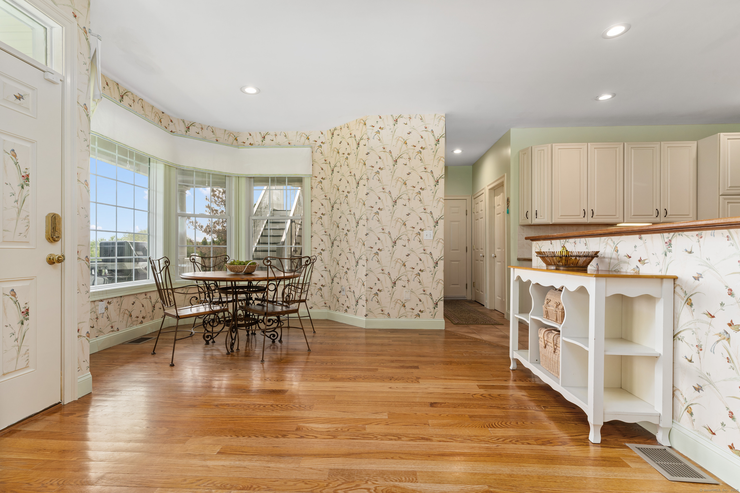 66-86 Bebbington Road Ashford, CT 06278 - Photo 9 of 39 a view of kitchen with furniture and wooden floor