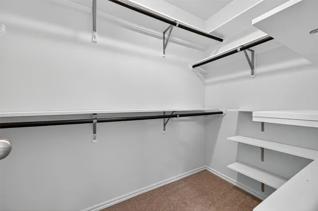 a view of a room with racks on the wall