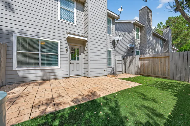 a house view with a backyard