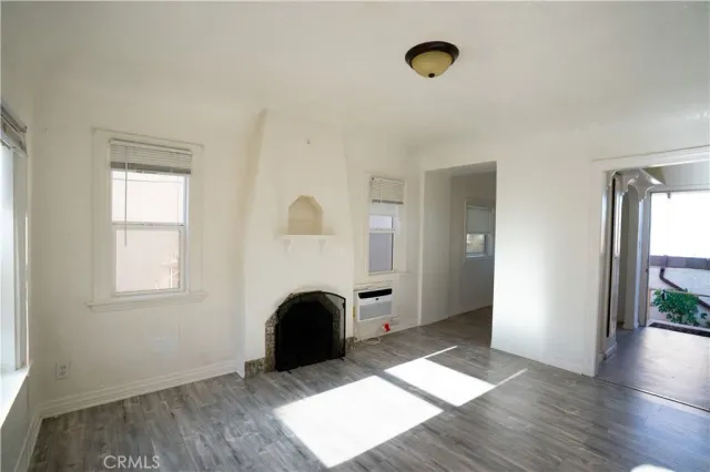 a view of livingroom with hardwood floor and window