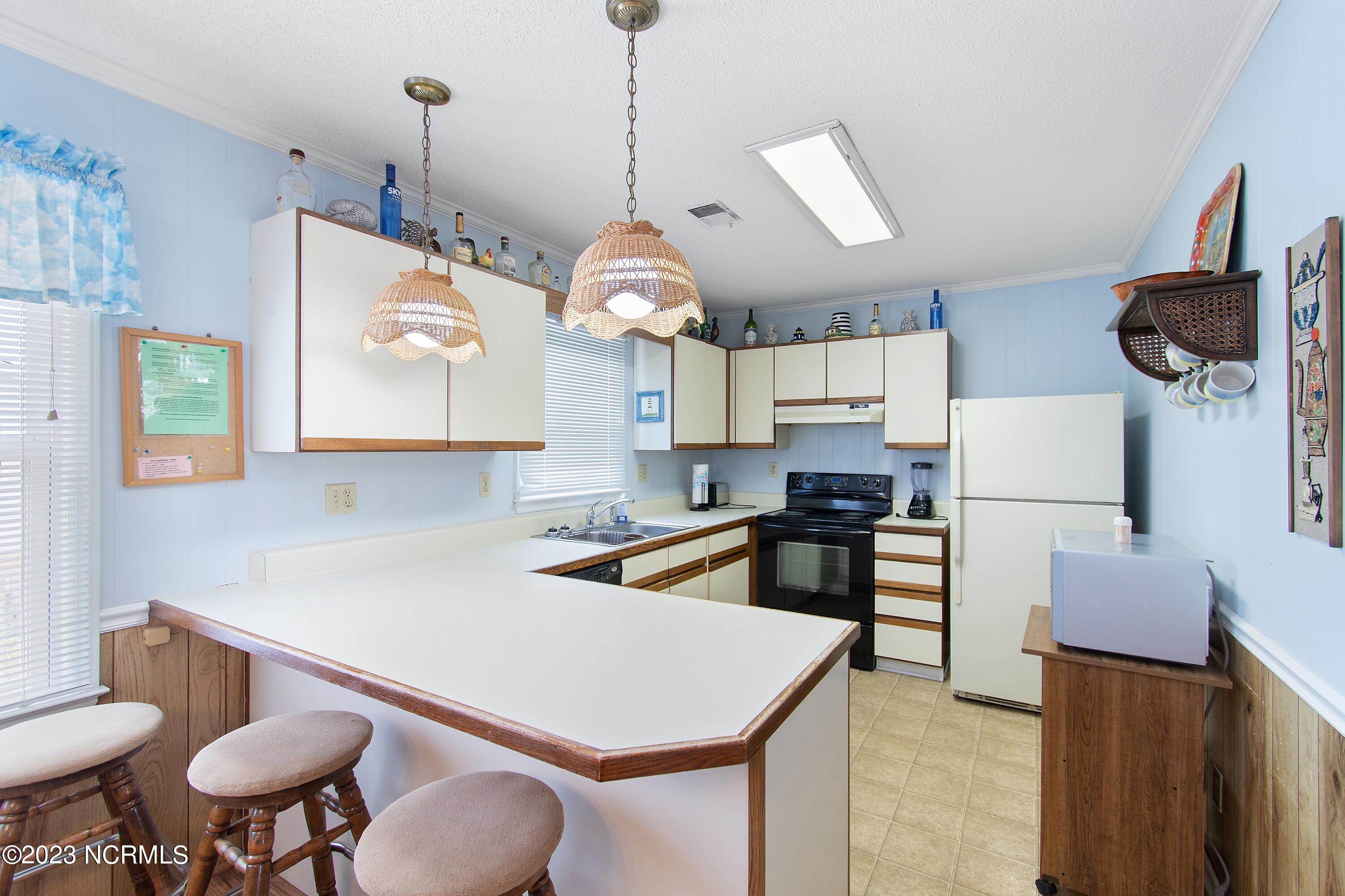 414 5th Street Sunset Beach, NC 28468 - Photo 17 of 47 Dine at Kitchen Bar