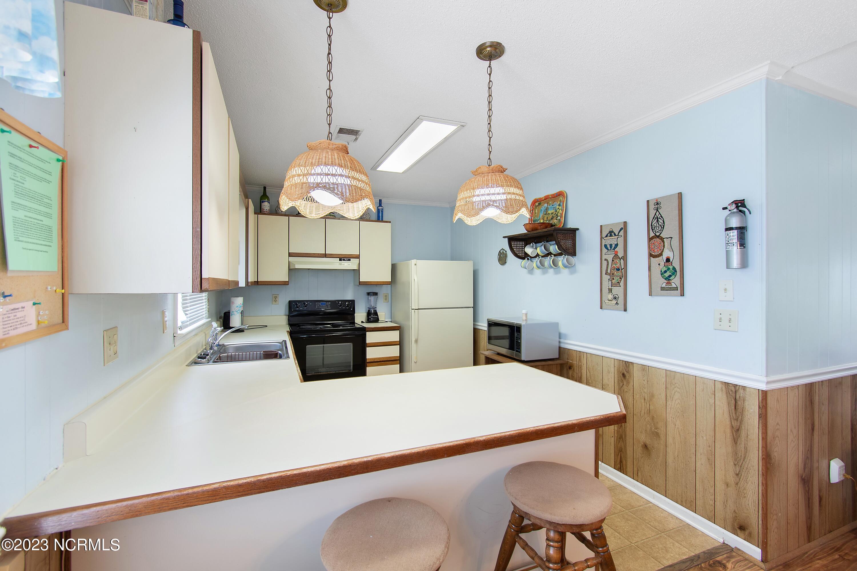 414 5th Street Sunset Beach, NC 28468 - Photo 18 of 47 Kitchen Space is light & bright