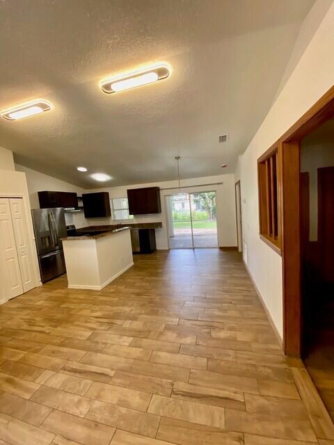 7500 Pensacola Road Fort Pierce, FL 34951 - Photo 4 of 7 Living Room & Kitchen