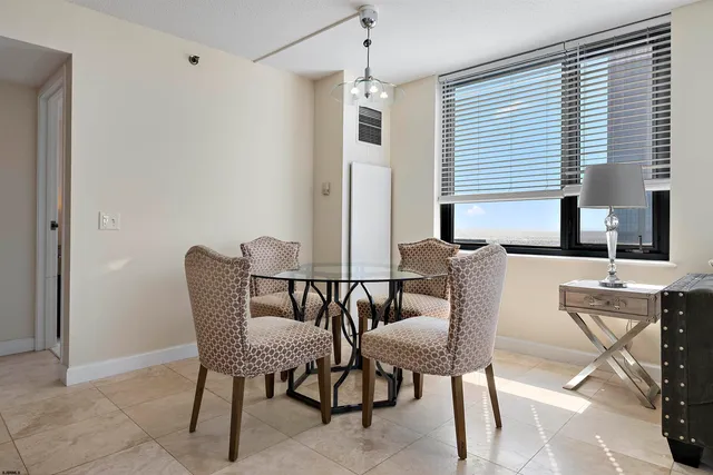 a view of a dining room with furniture
