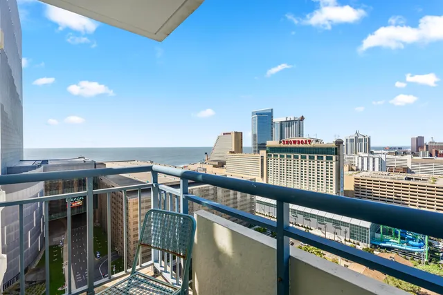 a view of a balcony with city view