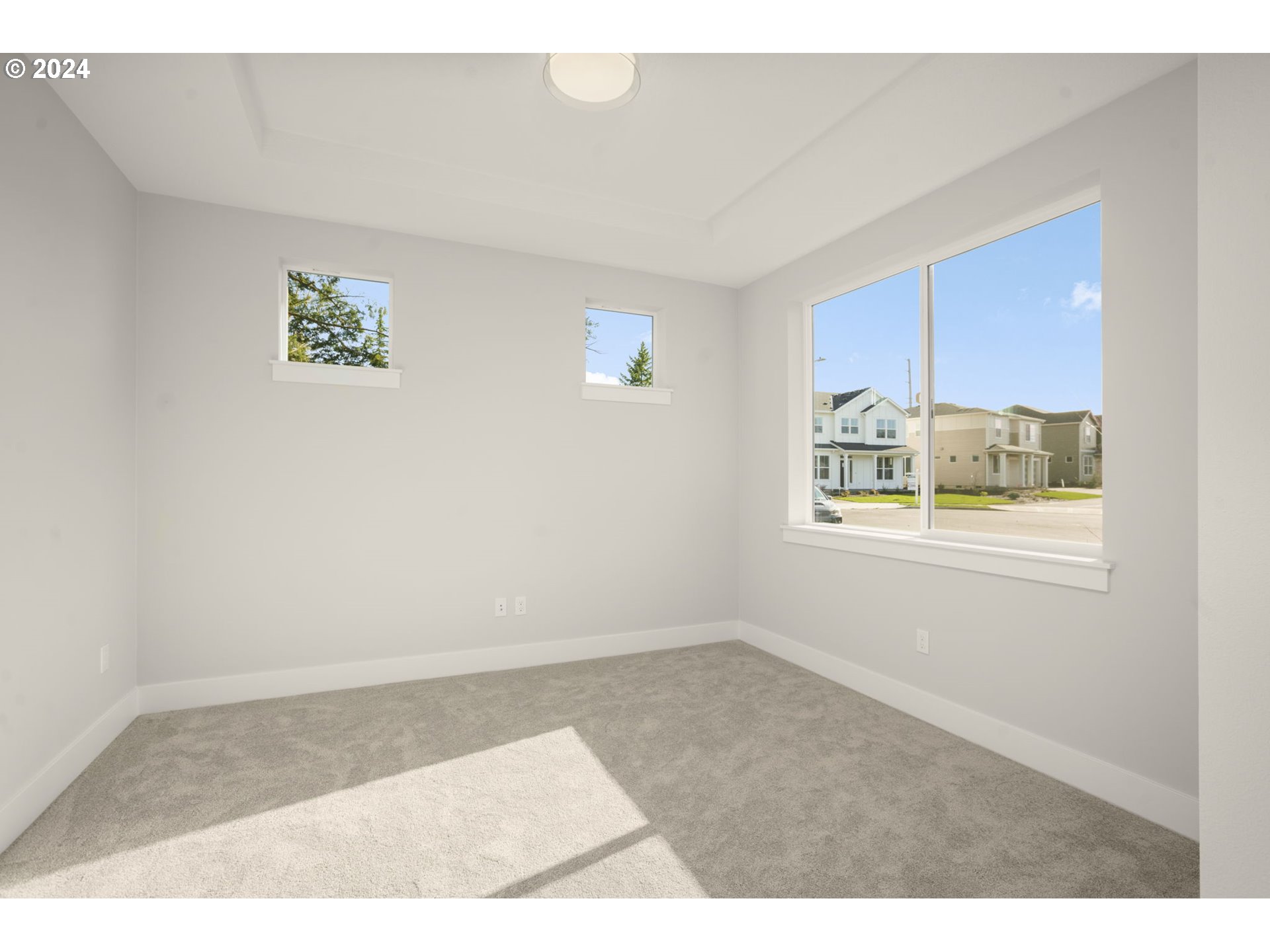7233 Northeast Ridge Drive Hillsboro, OR 97124 - Photo 20 of 24 a view of an empty room with a window