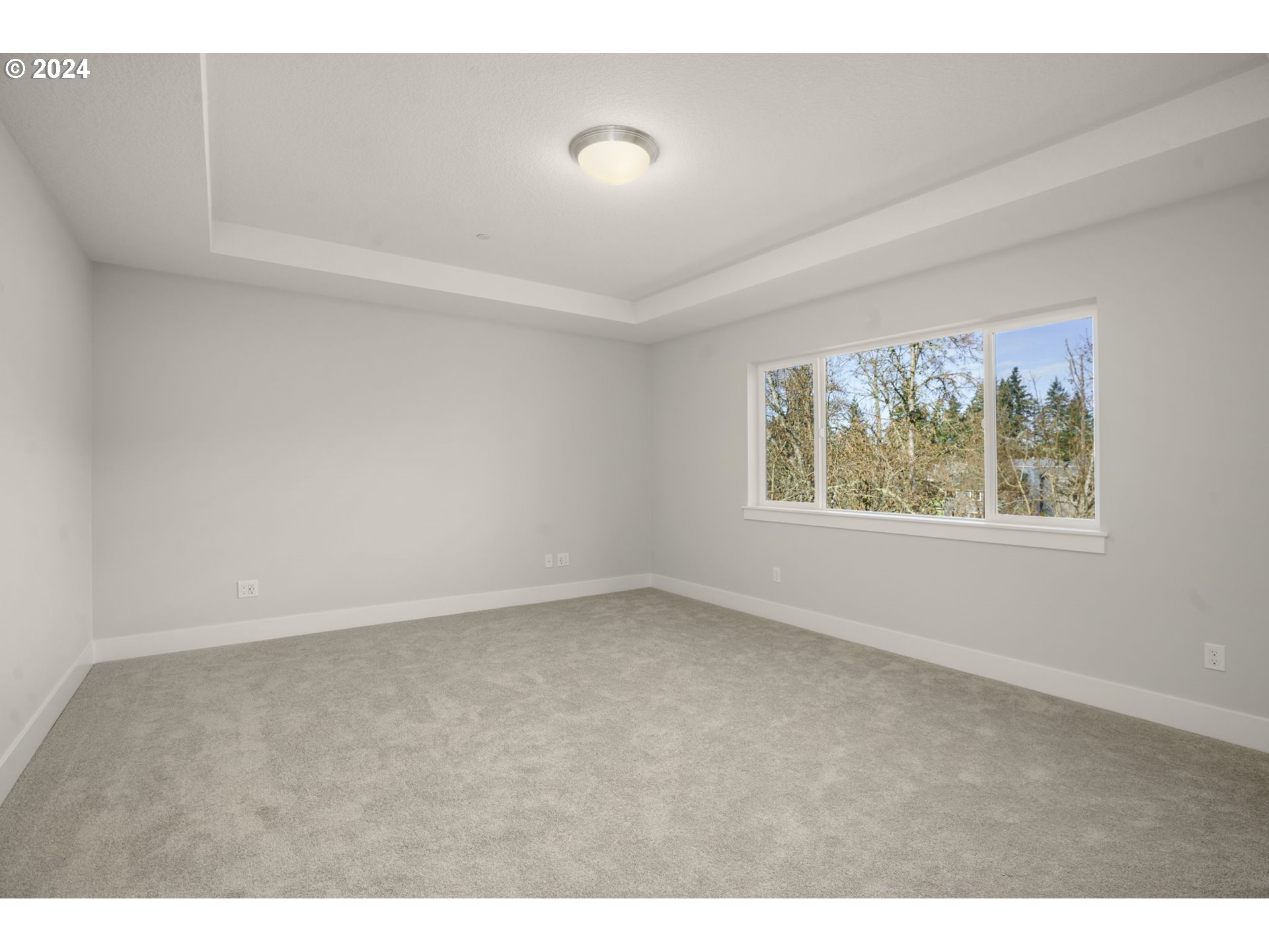 7233 Northeast Ridge Drive Hillsboro, OR 97124 - Photo 9 of 24 a view of an empty room with a window