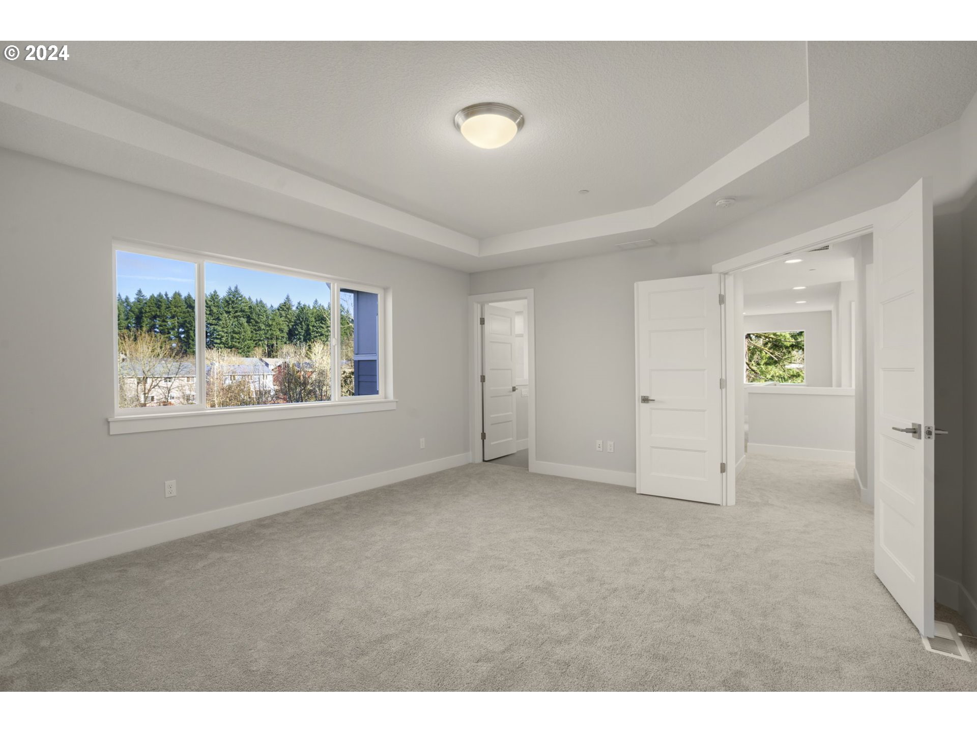 7233 Northeast Ridge Drive Hillsboro, OR 97124 - Photo 10 of 24 a view of an empty room with a window