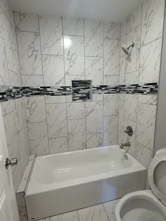 a bathroom with a sink and a bathtub