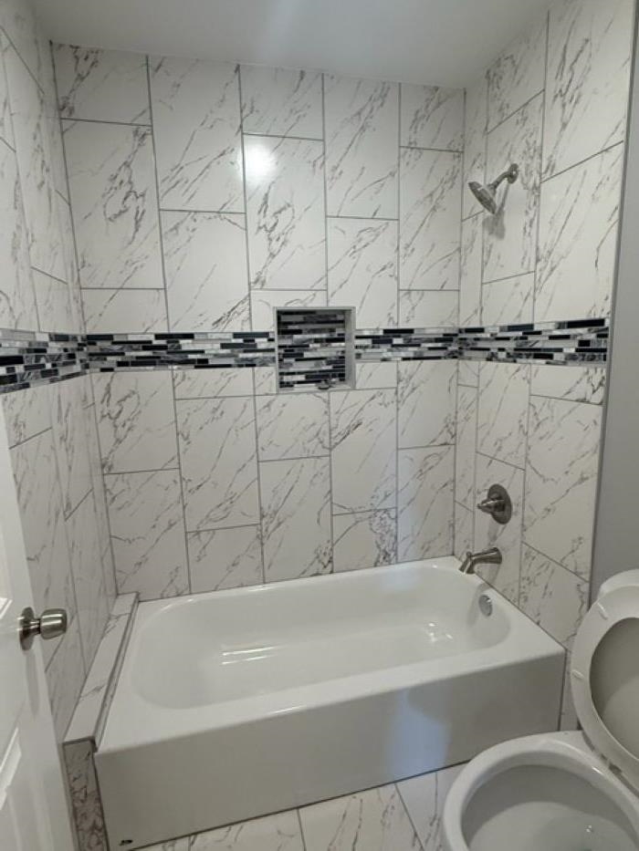 382 Carbon Road Memphis, TN 38109 - Photo 6 of 10 a bathroom with a sink and a bathtub