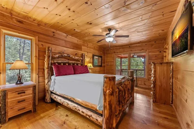 a bed room with a bed and a window