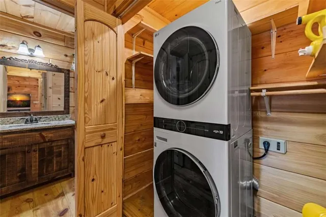 a view of a hallway with washer and dryer