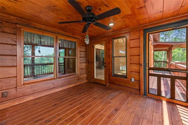 a view of a balcony with wooden floor