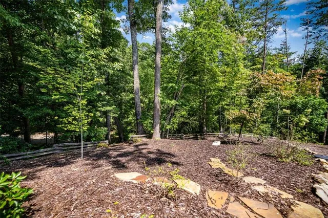 a view of parking garage with cars