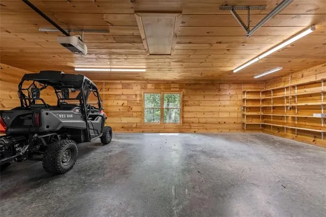 aerial view of a house with a yard