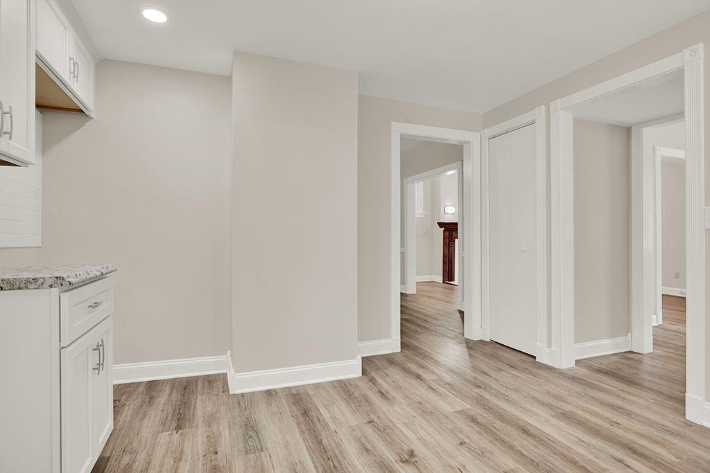 62 1st Street Irwin, PA 15642 - Photo 11 of 27 a view of hallway with wooden floor