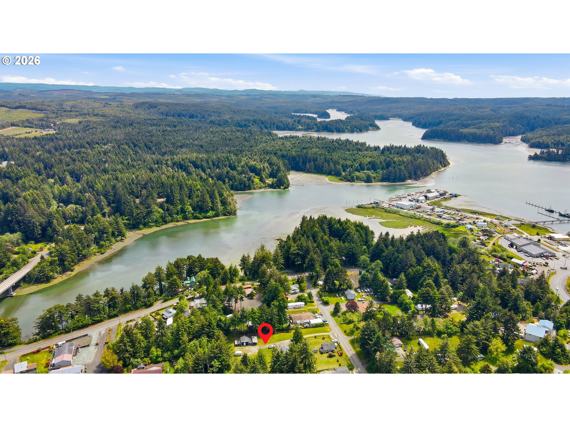 63299 Wildahl Road Coos Bay, OR 97420 - Photo 6 of 45 a view of a lake with a city