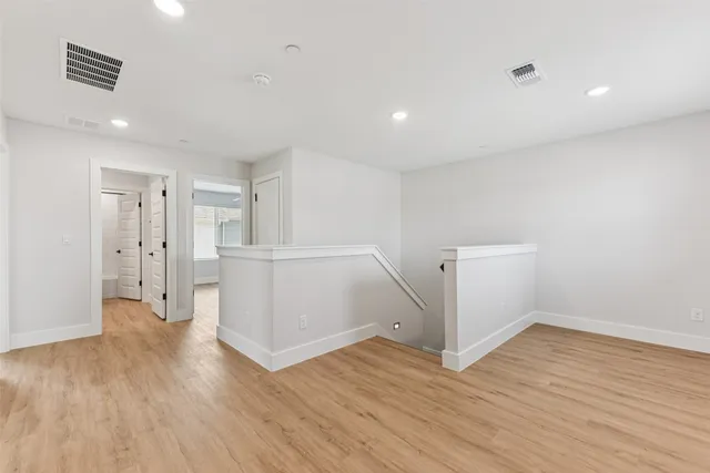 a bathroom with a granite countertop sink mirror and