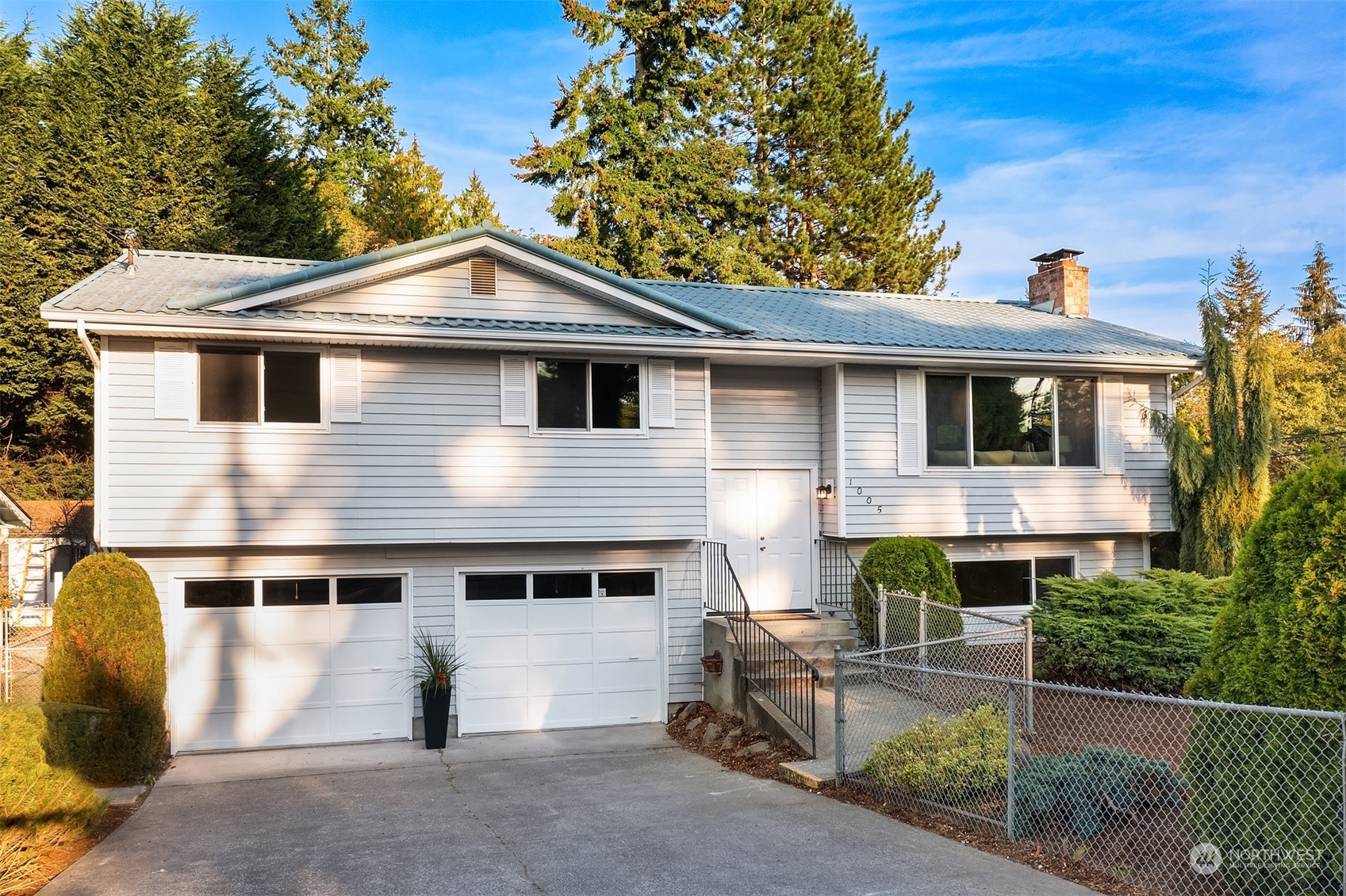 1005 Ave A Snohomish, WA 98290 - Photo 1 of 27 a view of a house with a yard and seating space