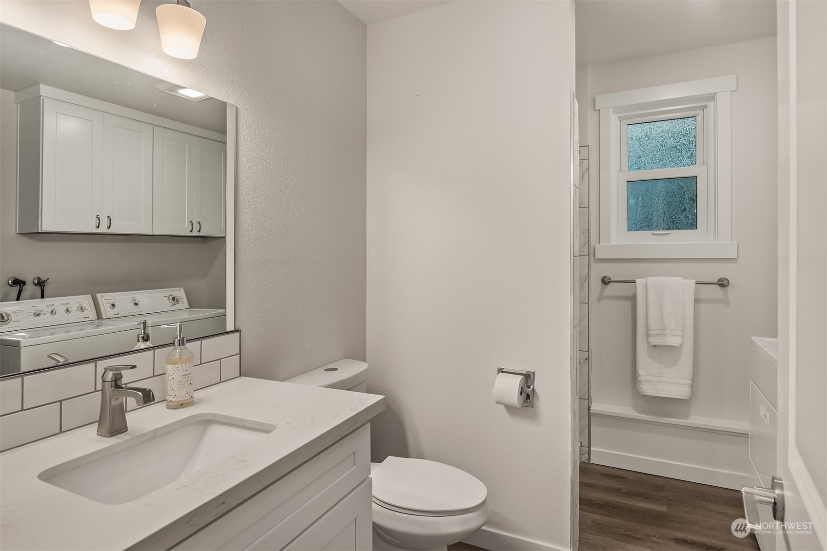 1005 Ave A Snohomish, WA 98290 - Photo 14 of 27 a bathroom with a sink a toilet and shower