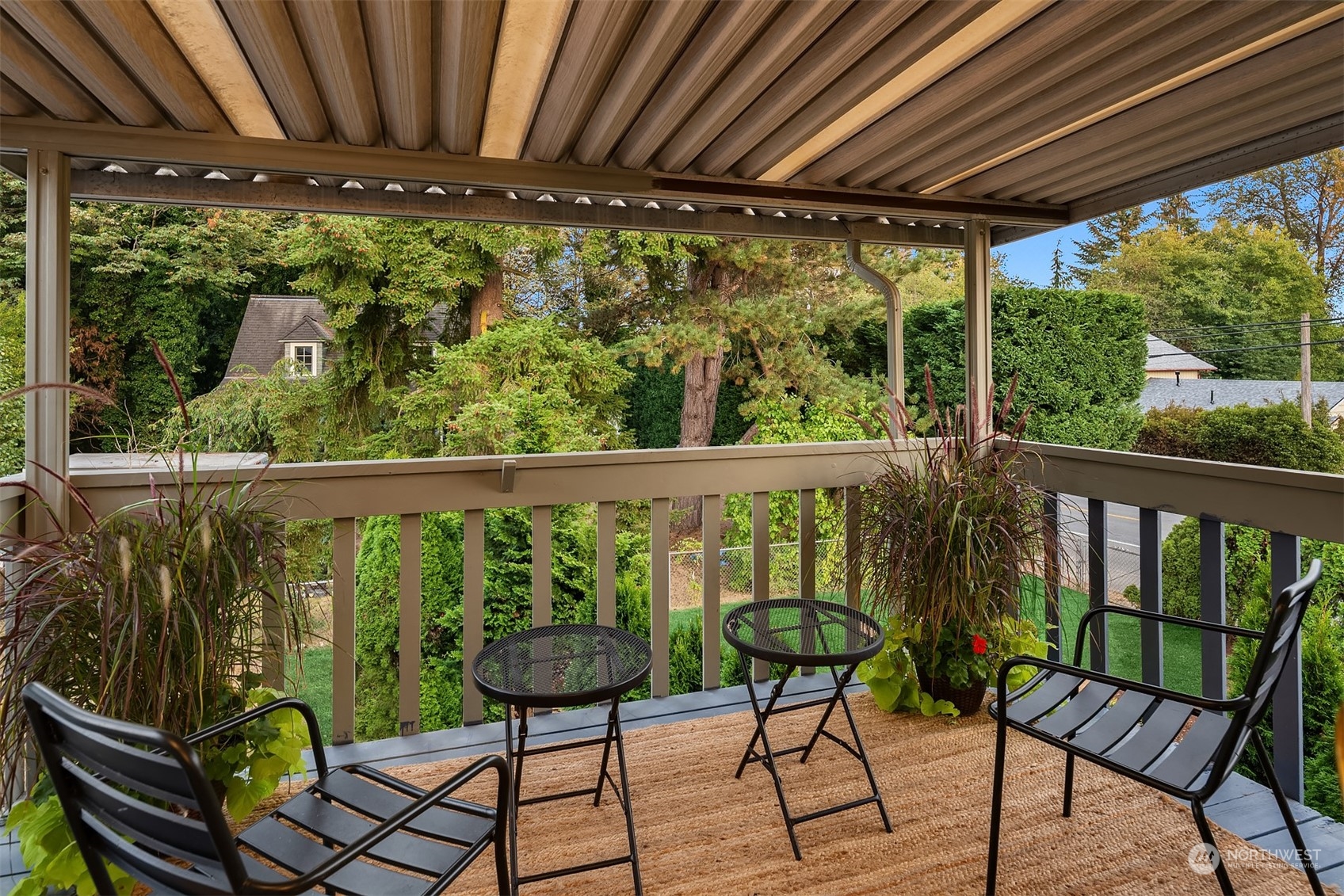 1005 Ave A Snohomish, WA 98290 - Photo 15 of 27 a view of a chairs and table in patio with wooden fence