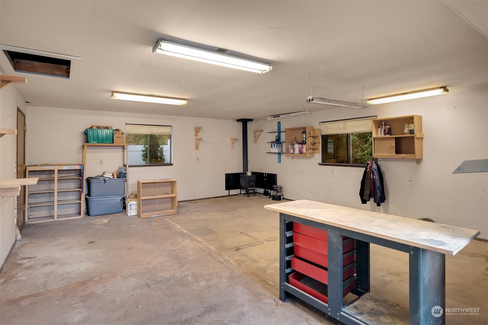 1005 Ave A Snohomish, WA 98290 - Photo 18 of 27 a living room with furniture and paintings on the wall