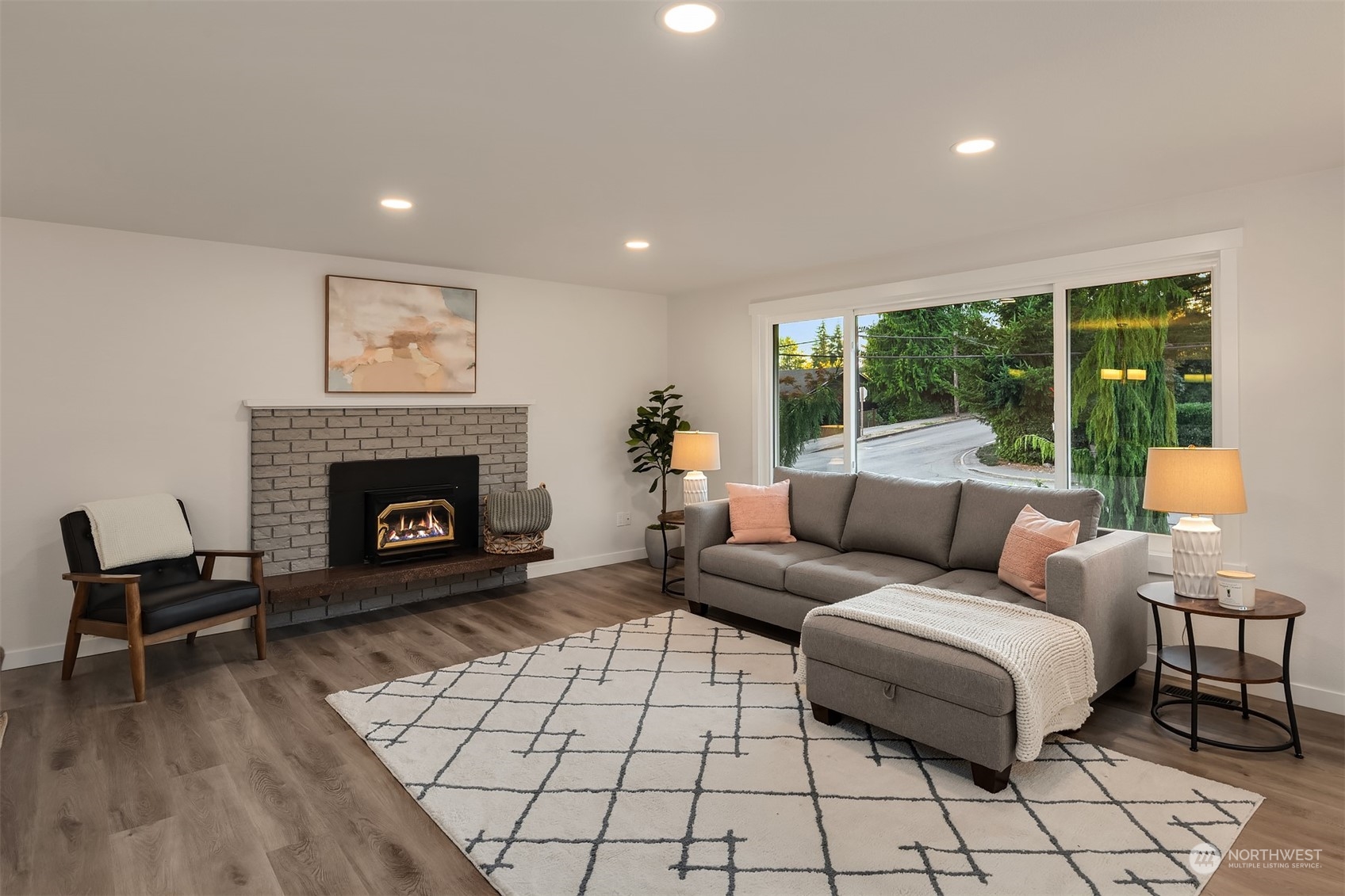 1005 Ave A Snohomish, WA 98290 - Photo 2 of 27 a living room with furniture and a fireplace