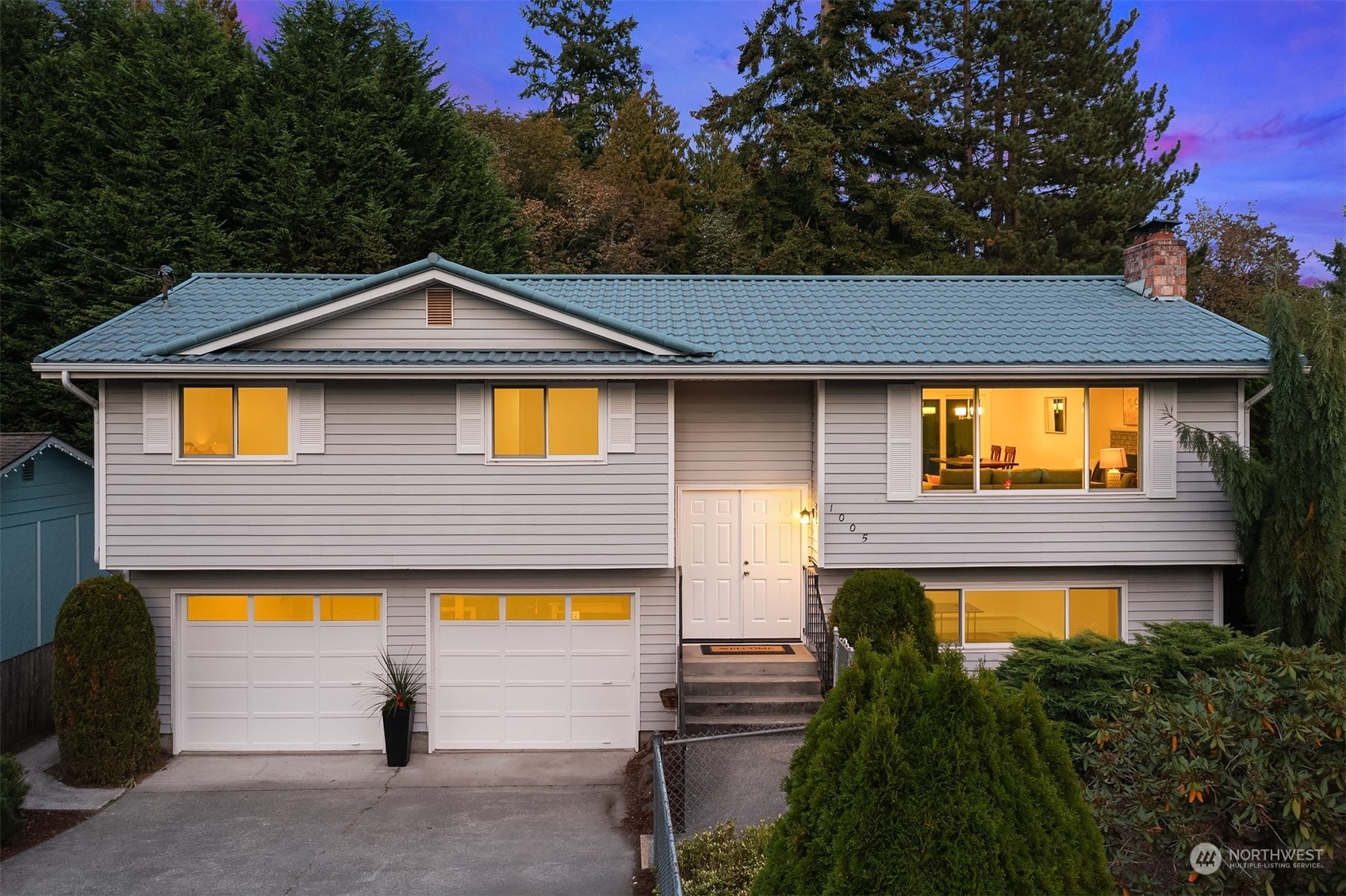 1005 Ave A Snohomish, WA 98290 - Photo 21 of 27 a front view of a house with a yard