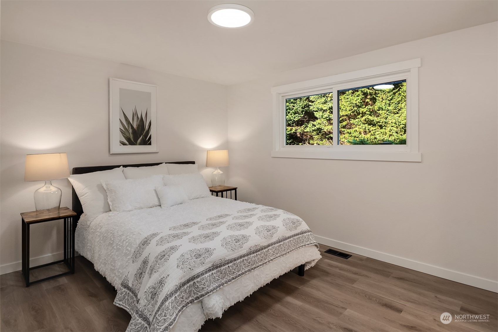 1005 Ave A Snohomish, WA 98290 - Photo 7 of 27 a bedroom with a bed and a window