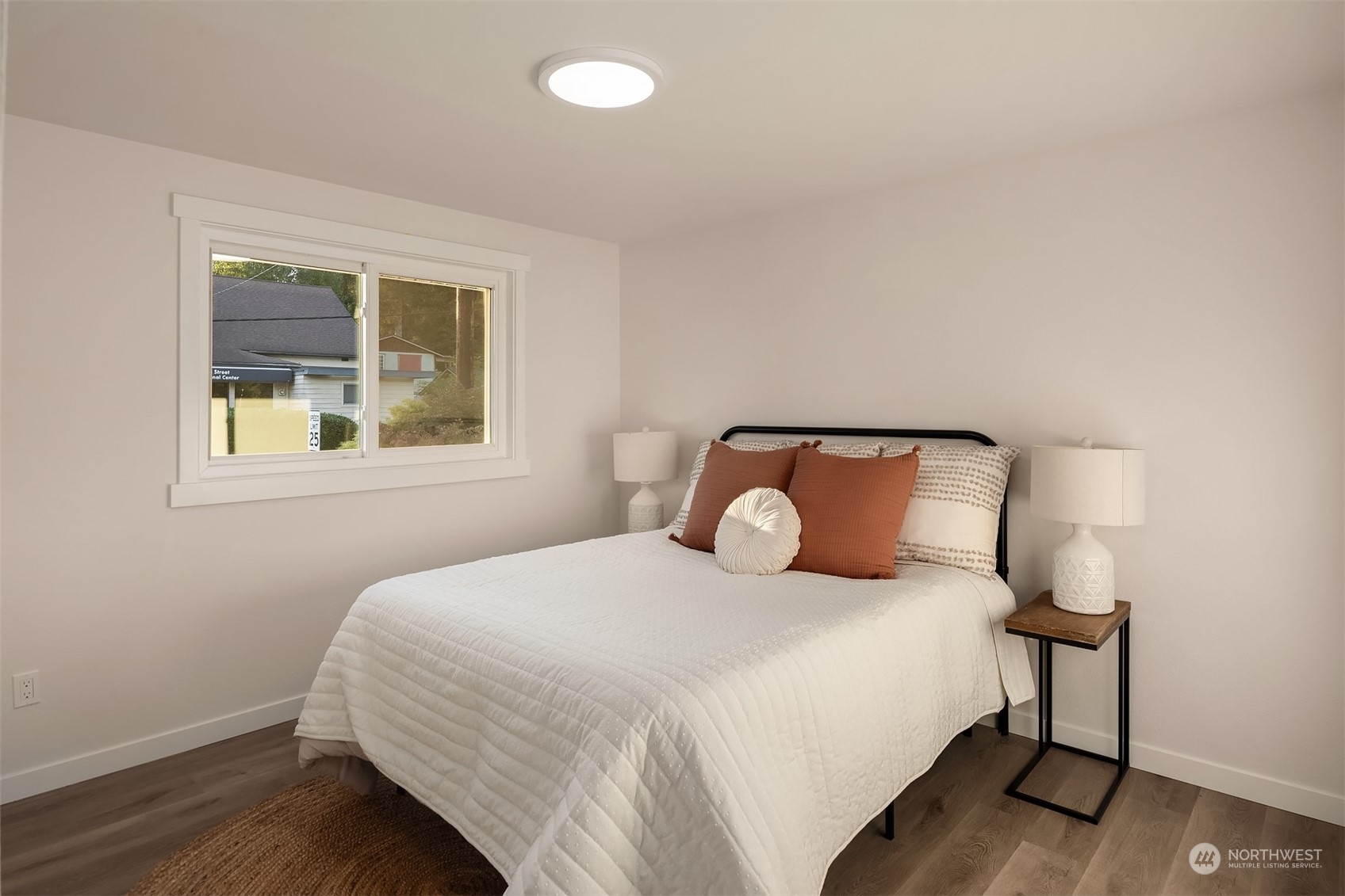 1005 Ave A Snohomish, WA 98290 - Photo 9 of 27 a bedroom with a bed and window