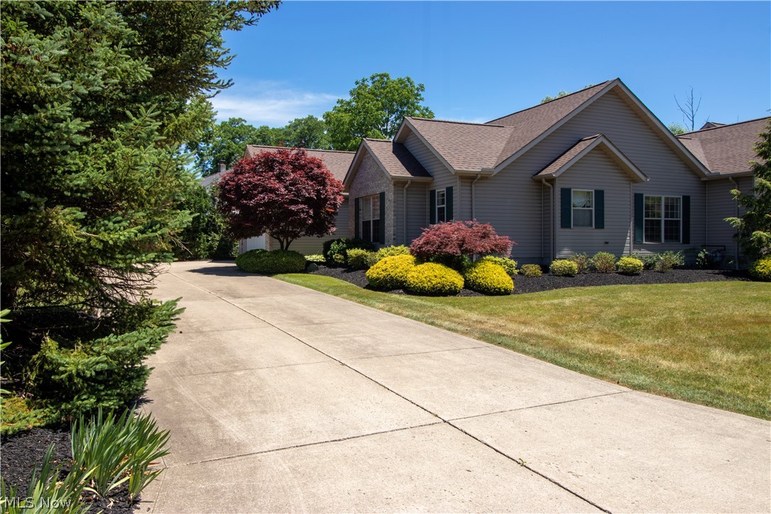 11116 Prouty Road, Unit A Painesville, OH 44077 - Photo 22 of 23 Beautiful landscaping and extra long driveway