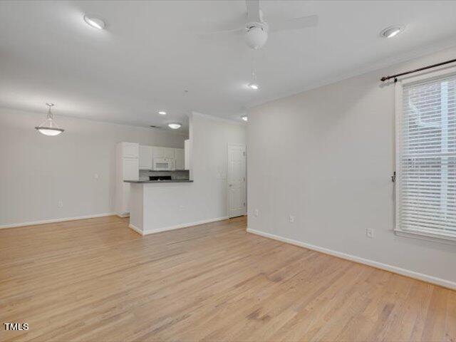 710 North Person Street, Unit 107 Raleigh, NC 27604 - Photo 14 of 20 Living Room-Dining Room-Kitchen