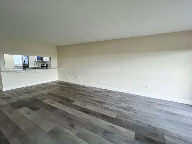 a view of a lake with a yard