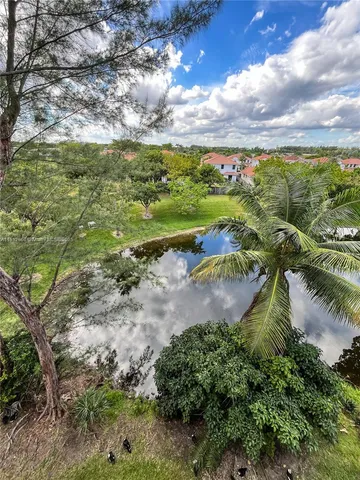 a view of entryway with wooden floor and glass door