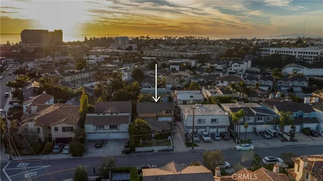 an aerial view of houses with outdoor space