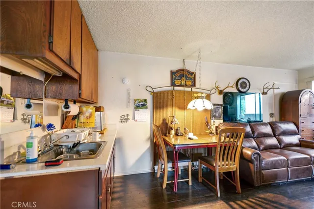 a view of a livingroom with furniture and window