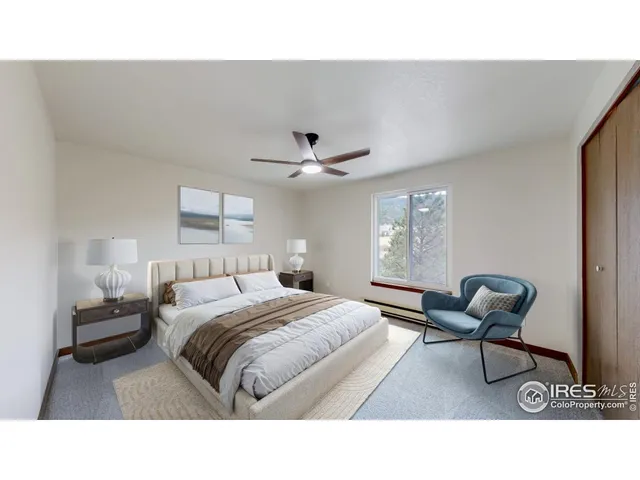 a living room with furniture and a ceiling fan