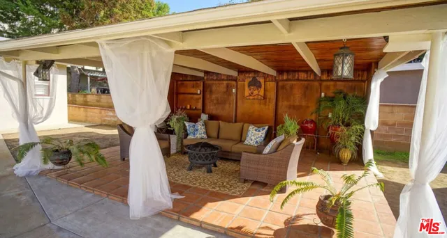 a view of porch with seating space