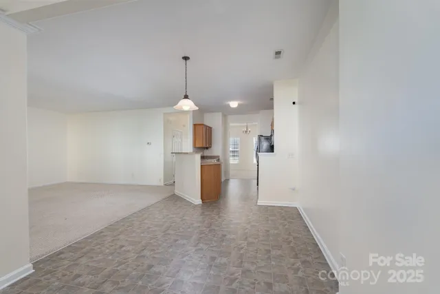 a view of a kitchen with a sink