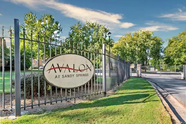 a view of a swimming pool with a garden