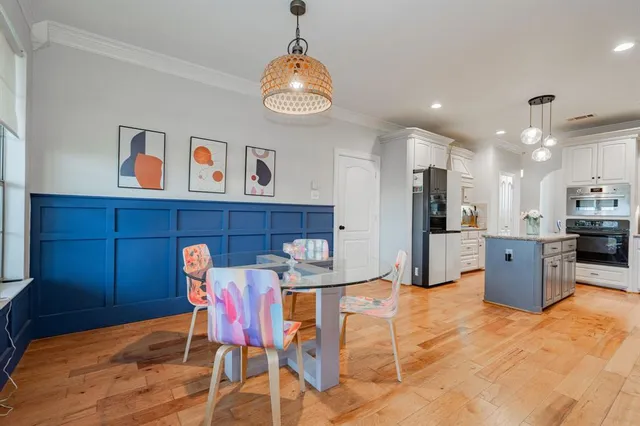 a view of a dining room with furniture