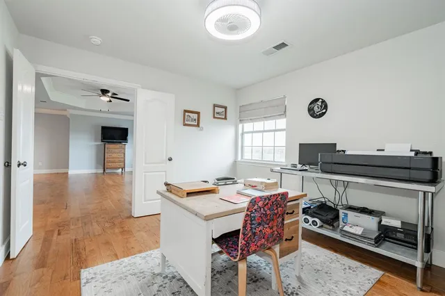 a workspace with furniture and window