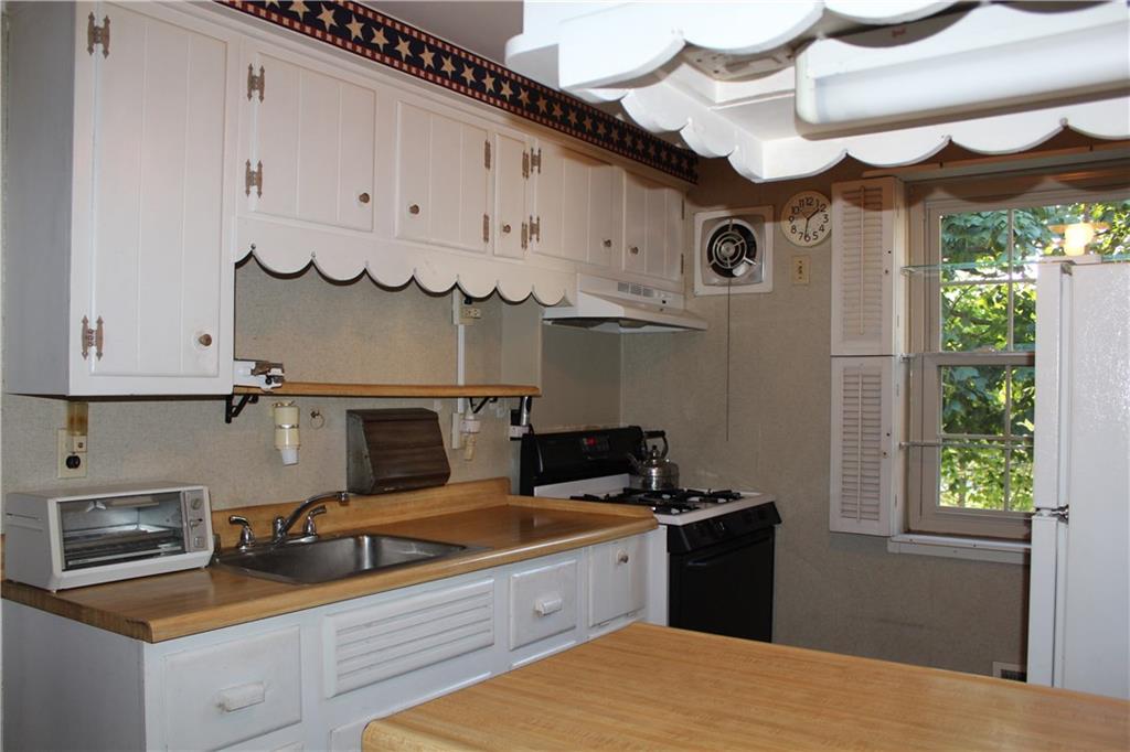 1906 Borland Road Pittsburgh, PA 15243 - Photo 8 of 16 Plenty of white cabinets for storage.