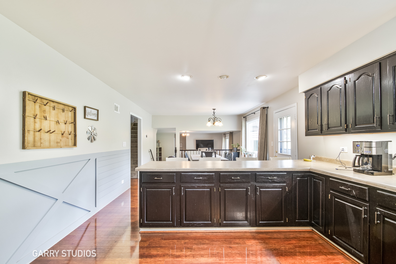 28824 Rivers Edge Drive Cary, IL 60013 - Photo 11 of 39 a kitchen with stainless steel appliances granite countertop a sink stove and cabinets