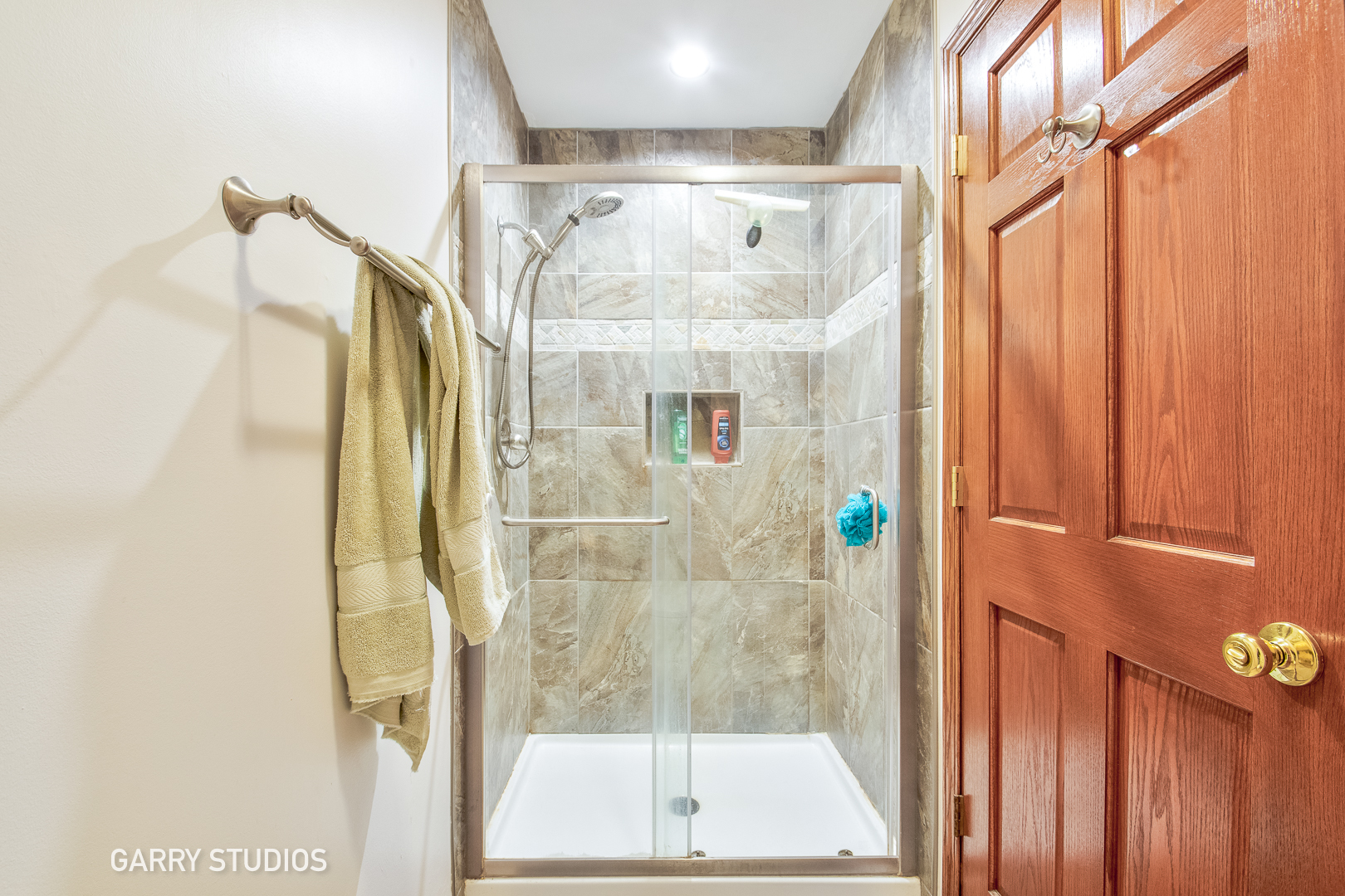 28824 Rivers Edge Drive Cary, IL 60013 - Photo 23 of 39 a bathroom with a shower and a mirror