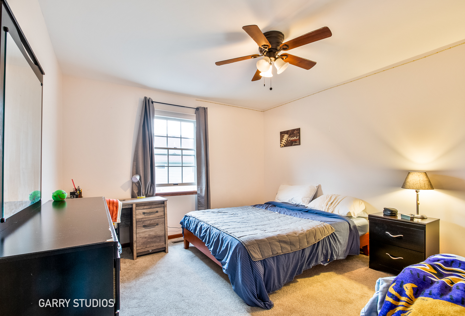 28824 Rivers Edge Drive Cary, IL 60013 - Photo 24 of 39 a bedroom with a bed and a chandelier
