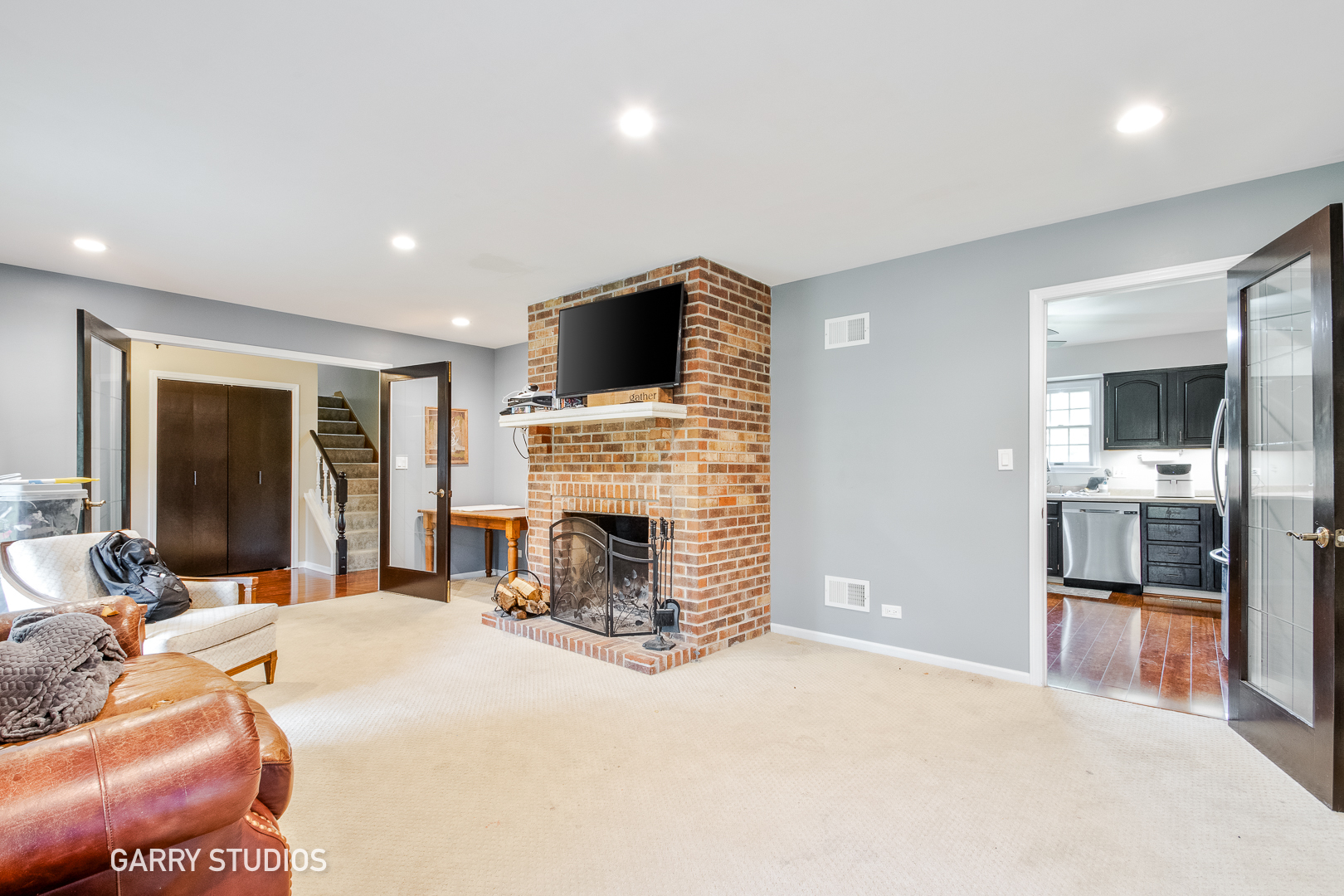 28824 Rivers Edge Drive Cary, IL 60013 - Photo 4 of 39 a bedroom with a bed and a television