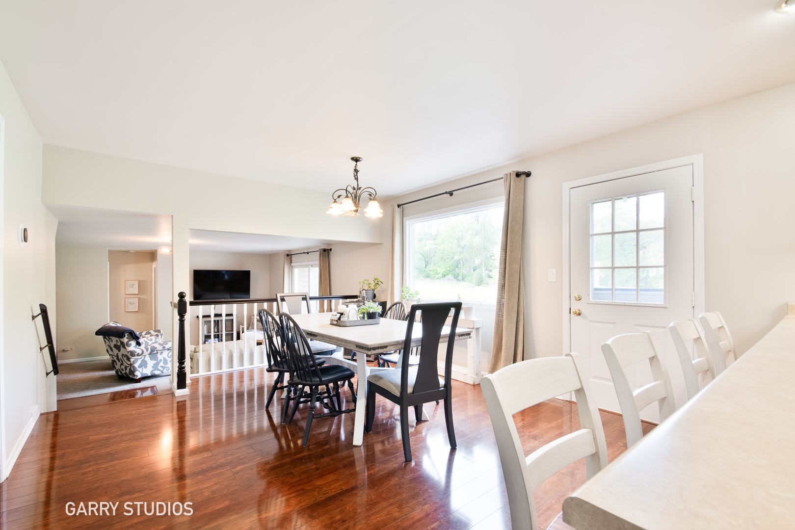 28824 Rivers Edge Drive Cary, IL 60013 - Photo 5 of 39 a view of a dining room with furniture window and wooden floor